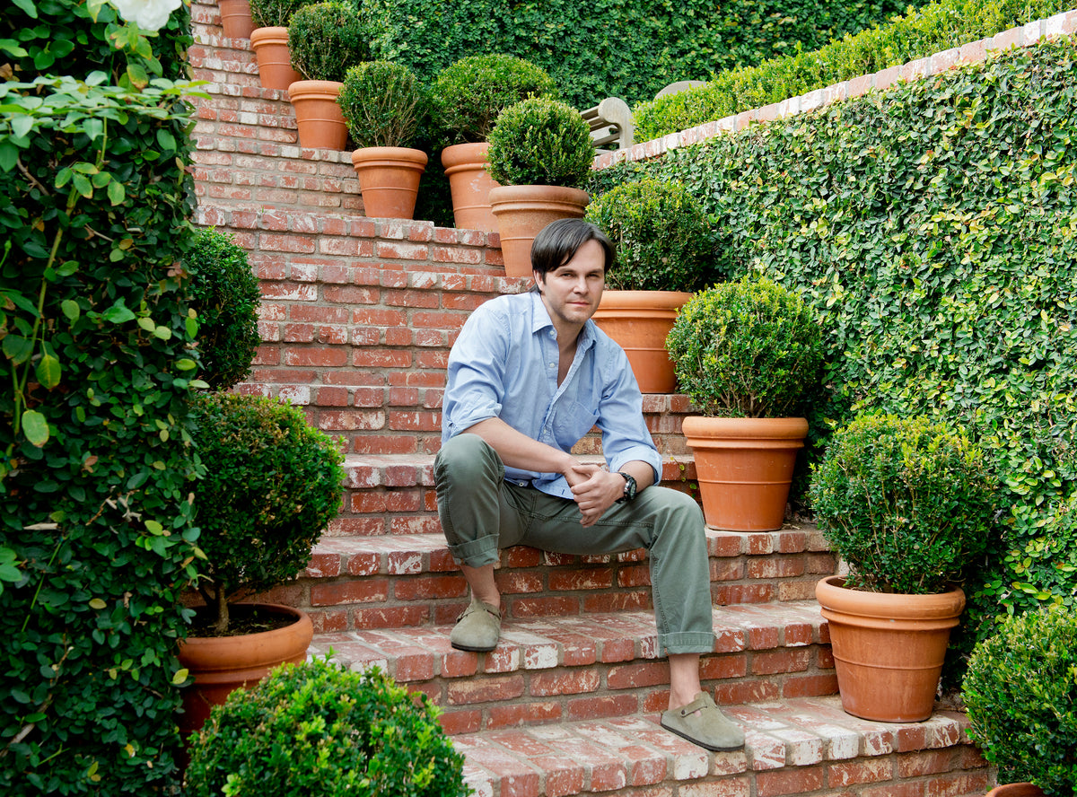 image of mark likes sitting on brick steps