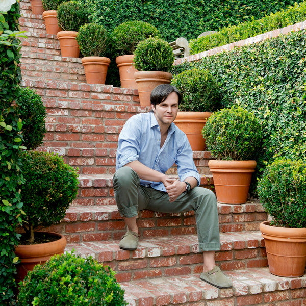 image of mark likes sitting on brick steps