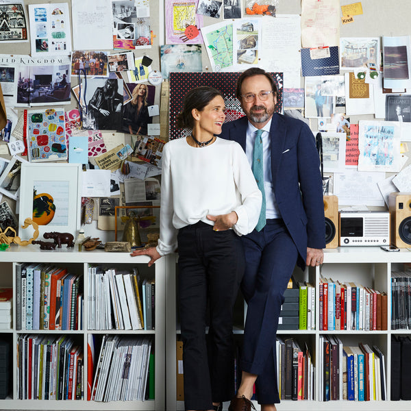 Sid and Ann Mashburn in front of bookcases