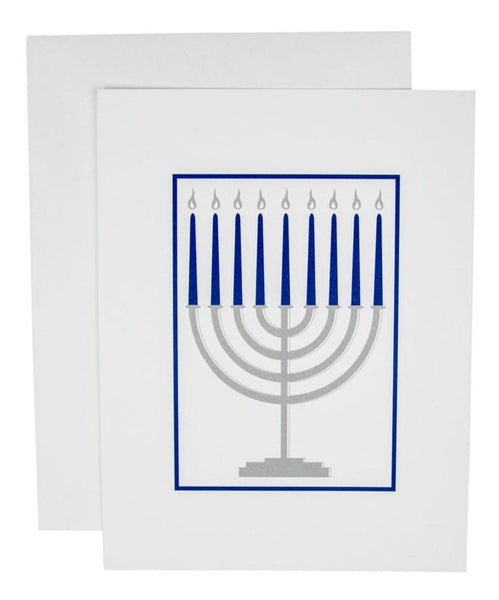 The Caspari Menorah Card Set by Caspari includes greeting cards showcasing an illustration of a Hanukkah menorah with lit candles on a white background, printed on high-quality cardstock using an FSC-certified printer.