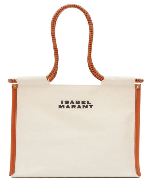 The Isabel Marant Toledo Shoulder Bag is a beige cotton tote with calfskin leather trim and handles, featuring the text "ISABEL MARANT" embroidered on the front in black uppercase letters.