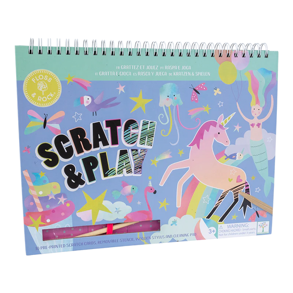 A colorful scratch art book titled "Floss & Rock Scratch & Play, Fantasy" featuring a unicorn, mermaid, and other whimsical elements on the cover. Includes a wooden stylus and is designed for children aged 3 and up. Part of the eco-friendly Floss and Rock books collection, it provides hours of creative fun.