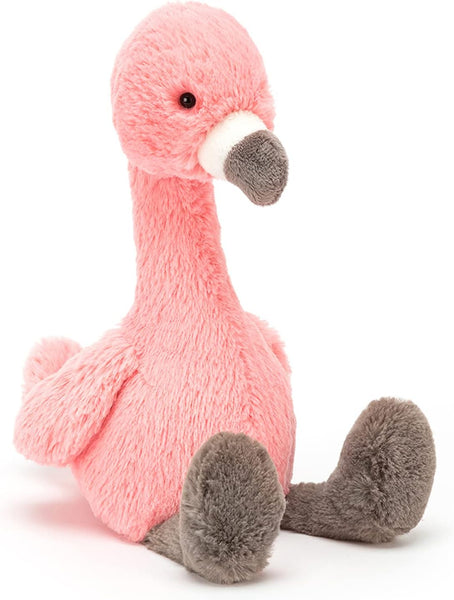 A Jellycat Bashful Flamingo, Medium plush toy featuring bright pink fur and a contrasting gray beak and feet sits upright against a plain white background, making the perfect cuddle buddy.