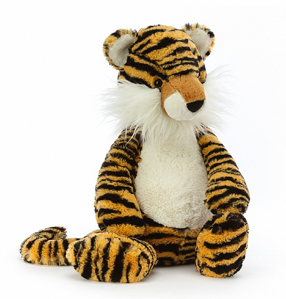 Bashful Tiger plushie sitting on a white background by Jellycat.