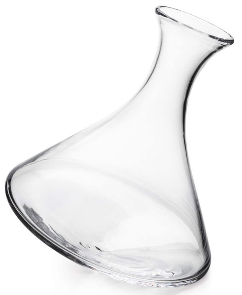 A Simon Pearce Walden Rolling Wine Decanter with a wide, flat bottom and a narrow, slightly angled neck, perfect for aerating wine.