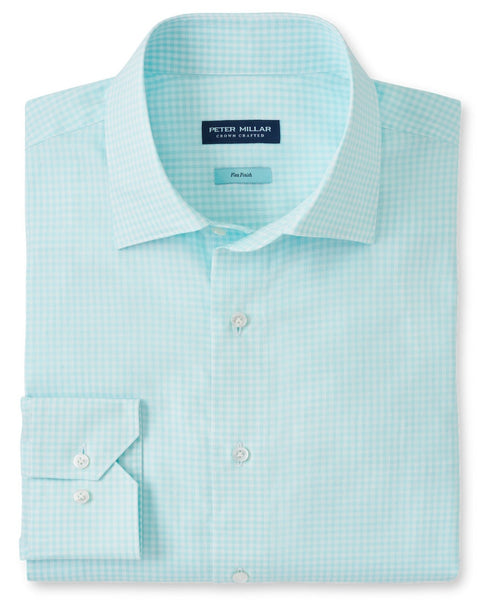 A neatly folded light blue checkered, long-sleeved dress shirt with a tailored fit and buttons, labeled "Peter Millar," showcases the Flex Finish of the Peter Millar Renato Cotton Sport Shirt.