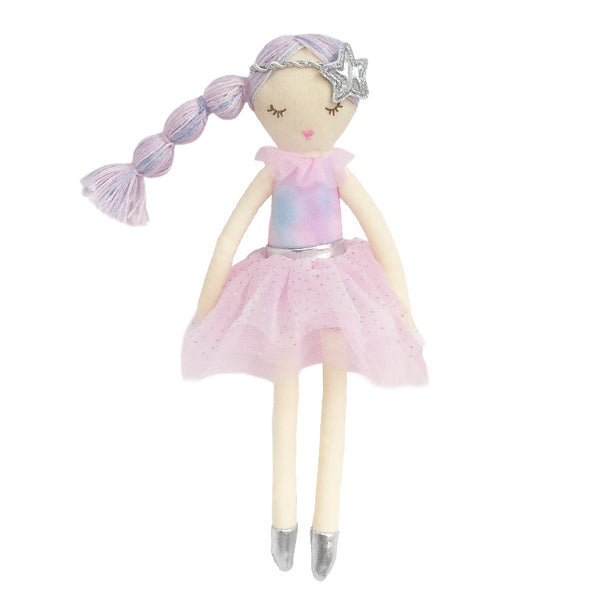 The MON AMI Sachet Scented Doll by Mon Ami features lavender hair styled in a braid, adorned with a star headband, and wears a pastel pink tutu with silver accents on its shoes and waistband. This delightful plush doll also emits a sugary fragrance, enhancing its irresistible charm.