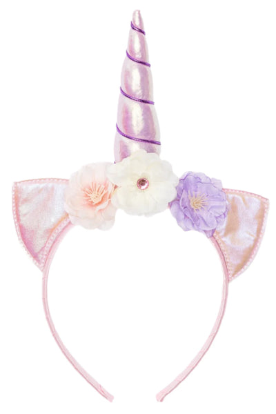 Great Pretenders Alicorn Headband: A pink unicorn accessory featuring a shiny lilac horn and fabric flowers in pink, white, and purple nestled between two ear shapes.