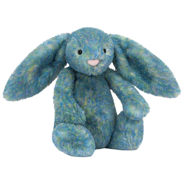 A Jellycat Bashful Luxe Bunny Azure, Medium with large ears and a speckled blue and green fur pattern sits against a plain background.