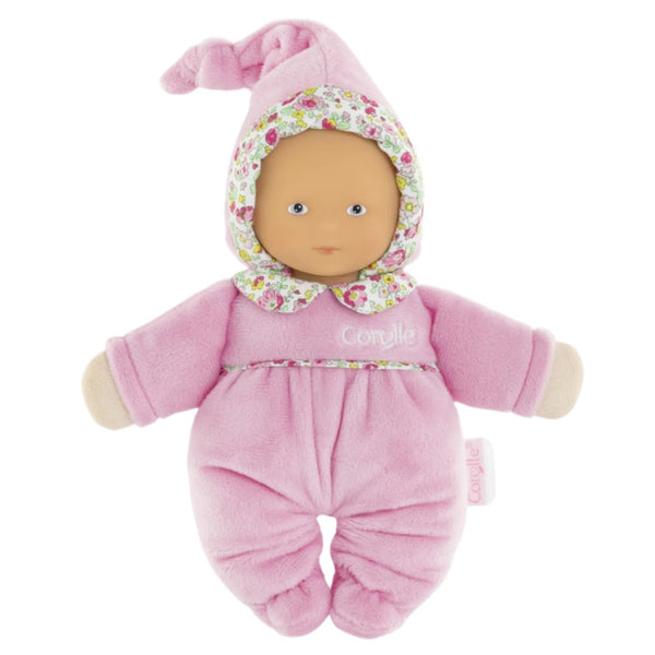 The Corolle Babidoux - Blossom Garden, by Corolle, offers an ultra-soft fabric doll dressed in a pink outfit with floral patterns on the hood and collar, making it the perfect soft baby doll companion.