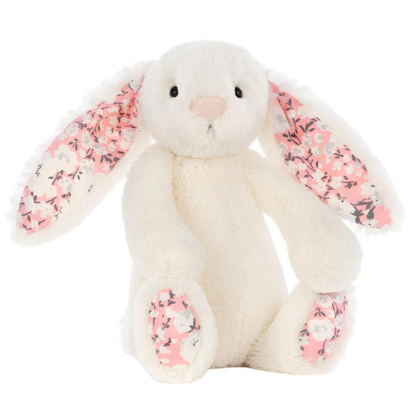 The Jellycat Blossom Cherry Bunny, Small, is a plush white bunny with floral-patterned inner ears and feet, making it perfect for nature lovers or as a charming spring gift.