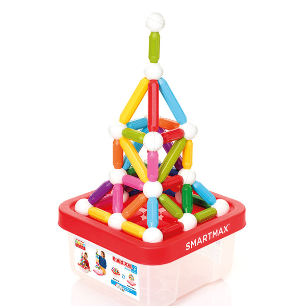 The Smart Games, SmartMax Build XXL set stacked in a geometric tower on top of a transparent storage unit with a red lid labeled "SmartMax" adds colorful magnetic construction fun.