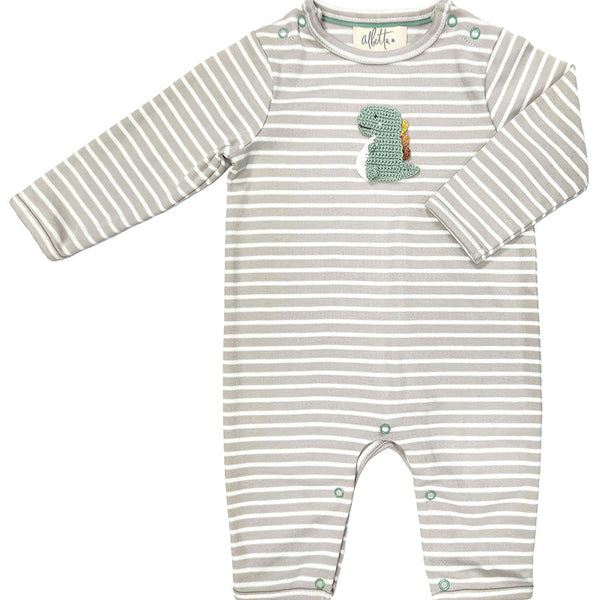 A gray and white striped organic cotton romper with long sleeves, featuring a small green hand-crocheted baby dinosaur detail on the chest, the Albetta Crochet Romper, Baby Dino by Albetta.