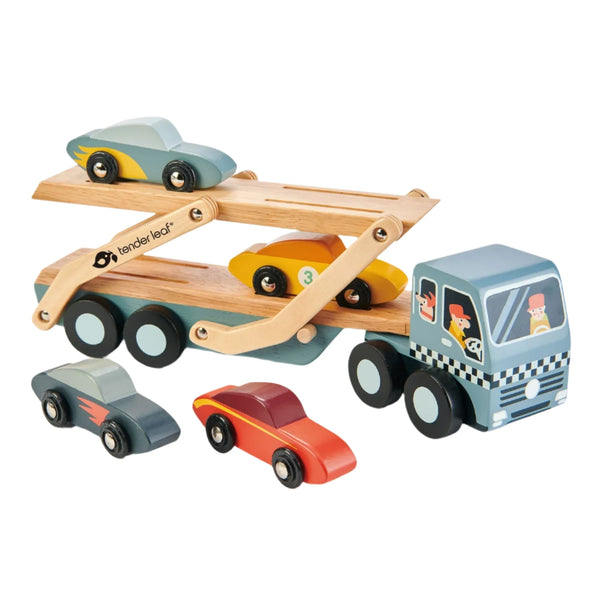 The Tender Leaf Car Transporter by Tender Leaf Toys is a wooden toy car set that includes a blue truck with a detachable carrier and six vibrant super cars, allowing some to be carried while others remain on the ground.