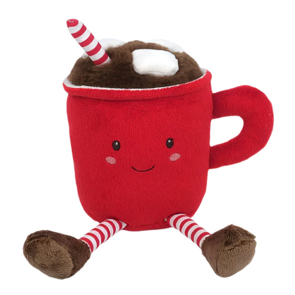 Introducing the MON AMI Cocoa Cup by Mon Ami: a charming Christmas plush toy shaped like a red mug with a smiling face, complete with striped legs, two marshmallows, and a striped straw on top. Perfect for hot chocolate lovers, this festive plush features a handle on the right side and is ideal for holiday decorating.