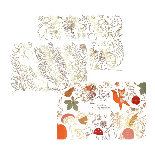 The Meri Meri Thanksgiving Colouring Placemats by Meri Meri feature three autumn-themed paper placemats adorned with animals, leaves, pumpkins, and a "Happy Thanksgiving" message, making them perfect for Thanksgiving table decor.