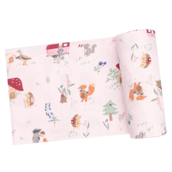 The Angel Dear Cute Animal Campers Swaddle Blanket features soft fabric adorned with delightful woodland creatures, including foxes and hedgehogs among trees and toadstools, making it ideal for swaddling or versatile design projects.