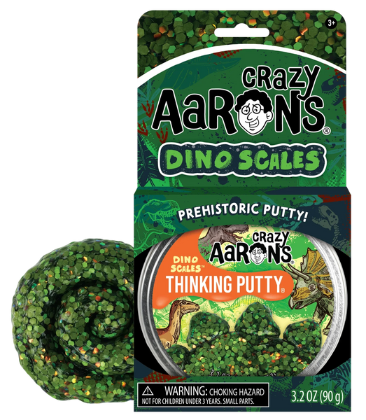 Crazy Aarons presents their Dino Scales Thinking Putty, showcasing a lively mix of green, orange, and brown non-toxic silicone putty with dinosaur-themed packaging. It's ideal for sensory integration and limitless creative enjoyment.