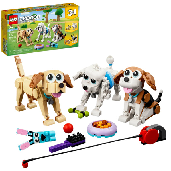 The LEGO® Creator Adorable Dogs 3-in-1 set by Legos - Toyhouse showcases three delightful dogs with toy accessories, all presented against the box packaging in the background.