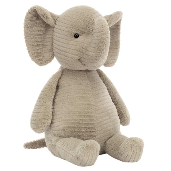 A Jellycat Quaxy Elephant plush toy by Jellycat is sitting upright, showcasing baby-soft faux-cord fabric with large ears and a curved trunk.