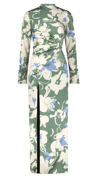 A Lela Rose Long Sleeve Draped Sheath Floral Satin Crepe Dress, adorned with white and blue floral print on green satin crepe and featuring a side slit.