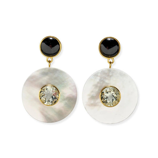 The Lizzie Fortunato Taj Disc Earrings feature gold-plated brass with black circular studs, beautifully highlighting large round mother-of-pearl discs embellished with central clear gemstones.