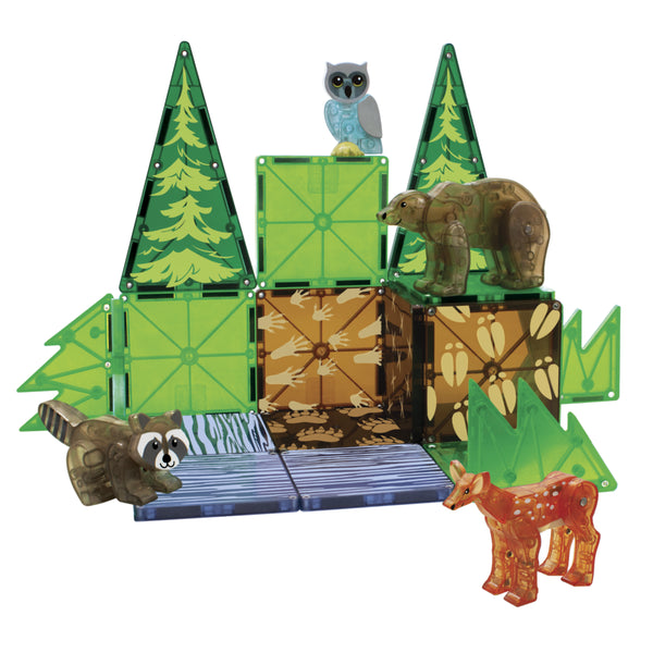 The MAGNA-TILES® Forest Animals 25-Piece Set from Magnatiles features toy animal figurines and green geometric building blocks arranged to resemble a woodland scene with trees. The imaginative play set includes a bear, deer, raccoon, and an owl perched on top of the structure.