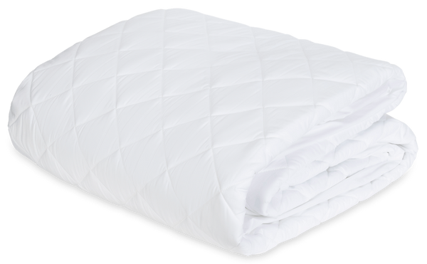 A white, folded Matouk Foundation Mattress Pad with a diamond stitch pattern is displayed on a plain background, featuring a luxurious Ceylon percale fabric.