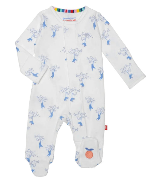 The Magnetic Me Love our Friend-Chimp Footie by Magnetic Me is a white baby onesie featuring a delightful blue floral and bird pattern. Made from GOTS certified organic cotton, it boasts long sleeves, enclosed feet, and a convenient front zipper. A small orange patch on the ankle adds a charming touch, making it an essential piece for any baby's wardrobe.