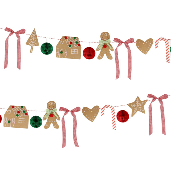 The Meri Meri Gingerbread Garland by Meri Meri showcases a delightful assortment of festive gingerbread men, whimsical houses, hearts, stars, an enchanting tree, and lively red and green ornaments. It's beautifully adorned with red gingham bows on a white backdrop and makes an ideal Christmas decor piece or holiday decoration centerpiece.