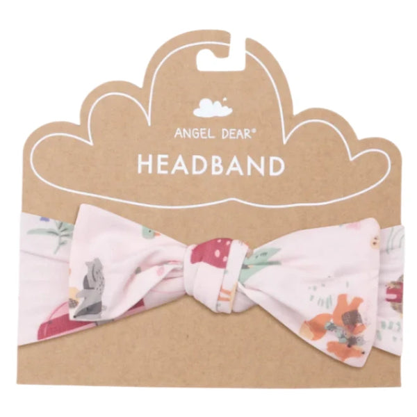 A vibrant print adorns the white headband crafted from soft bamboo viscose, which comes attached to a cloud-shaped brown cardboard backing labeled "Angel Dear Cute Animal Campers Headband.