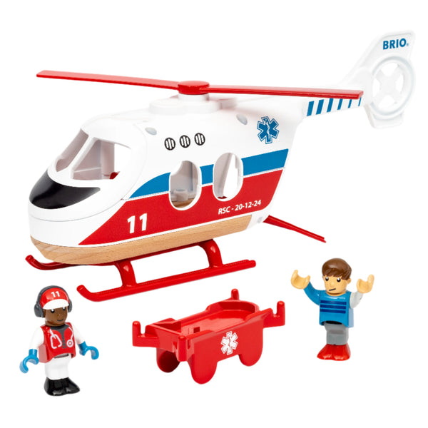 The BRIO World Rescue Helicopter by Brio comes in vibrant red and white colors, and includes miniature figures of a pilot and a boy. Equipped with a stretcher and spinning rotor blades, this exciting toy is perfect for thrilling adventures.