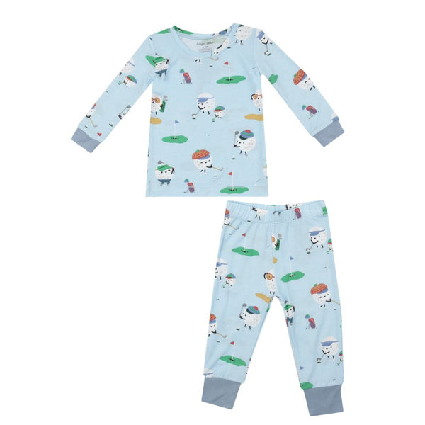 The Angel Dear Golf Club Pro LS Loungewear Set by Angel Dear is a matching light blue ensemble featuring a long-sleeve top and pants, crafted from bamboo viscose with a playful snowman and golf-themed pattern.