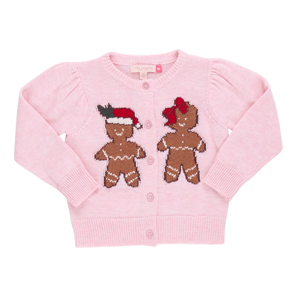 The Pink Chicken Girls Constance Sweater by Pink Chicken showcases a pink design with two glittery gingerbread intarsia figures on the front, each wearing festive accessories.