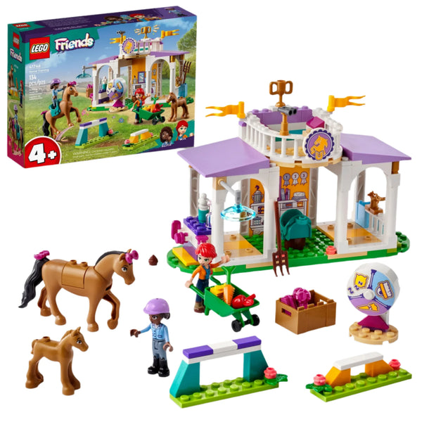 The LEGO® Friends Horse Training set by Legos - Toyhouse is perfect for ages 4+, featuring a stable, horse and foal figures, and two minidolls. The box is included in the background.