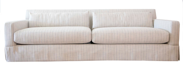 A beige upholstered Extra Long Sofa by Lee Industries with two seat cushions and two back cushions, featuring a minimalist design and clean lines, perfect for any West Palm Beach home.