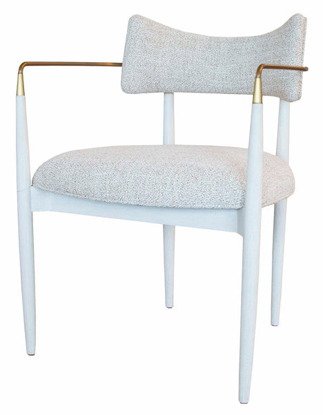 A modern **Durrant Arm Chair** with a white cushioned seat, matching cushioned backrest, thin golden armrests, and slender white legs evokes the elegance of **Mr Brown**.