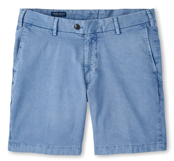 Light blue Peter Millar Concorde Garment-Dyed Shorts crafted from soft cotton, featuring a button and zip closure, front and back pockets. Garment dyed for a unique finish.