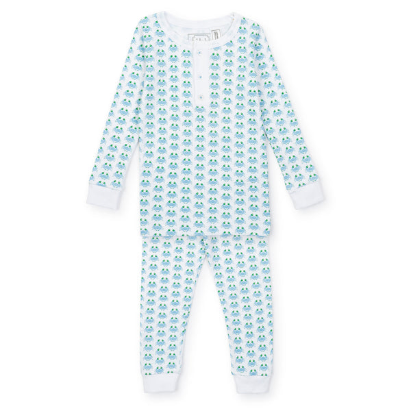 A Lila & Hayes Boys' Jack Pajama Set in white Peruvian Pima cotton with a small blue and green turtle pattern, featuring a button-up front and matching pants.