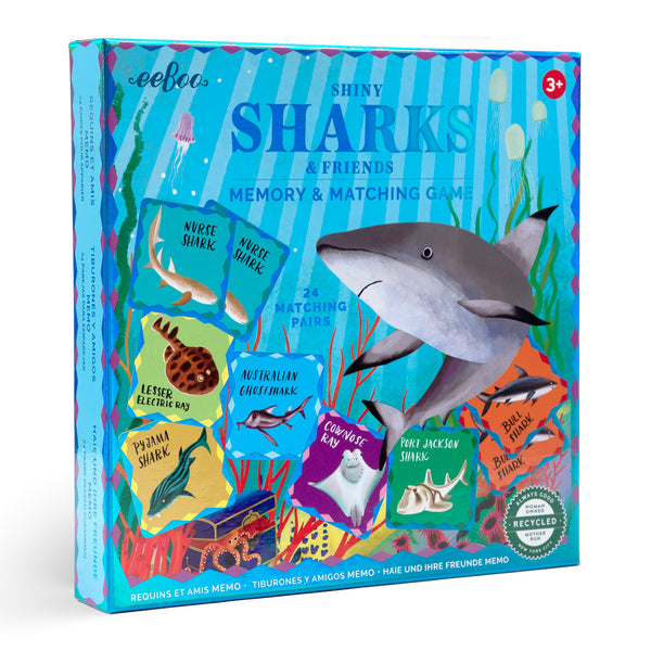 Image of a blue-lidded box titled "eeboo Sharks & Friends Shiny Memory Matching Game" by Eeboo. The cover displays various illustrated marine animals, including different shark species, such as nurse sharks and hammerhead sharks. Perfect for enhancing memory skills through this fun and educational activity.