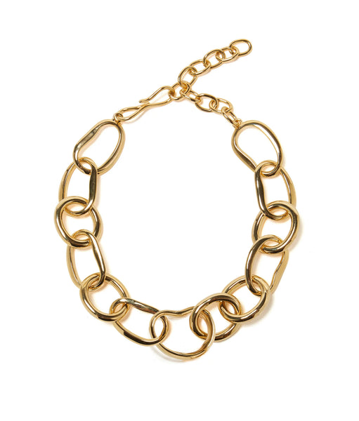 The Lizzie Fortunato Porto Chain Necklace from Lizzie Fortunato showcases oversized abstract links with large interlocking oval and round designs, crafted from gold-plated brass, making it an unforgettable statement piece.