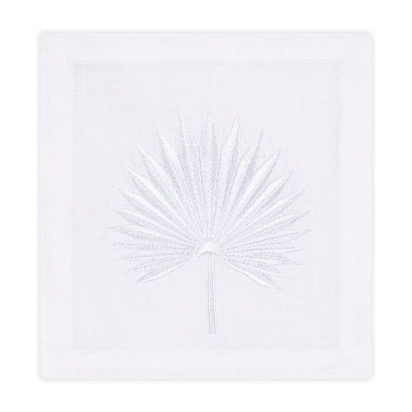 Square white Italian linen Palm Coasters, Set of 4 by Haute Home hand embroidered with a palm leaf design in the center.