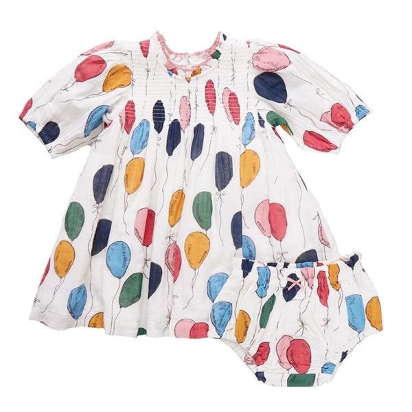 A Baby Girls' Puff Sleeve Stevie Dress Set by Pink Chicken, featuring a vintage-inspired smocked front with colorful Balloon Bunches print and matching diaper cover.