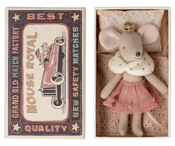 A Maileg Princess Mouse, Little Sister in Matchbox - Rose is delicately placed in a decorative matchbox toy adorned with vintage-style artwork reading "Mouse Royal Best Quality New Safety Matches Grand Old Match Factory." This charming piece from Maileg makes an ideal children's gift, blending whimsy and nostalgia.