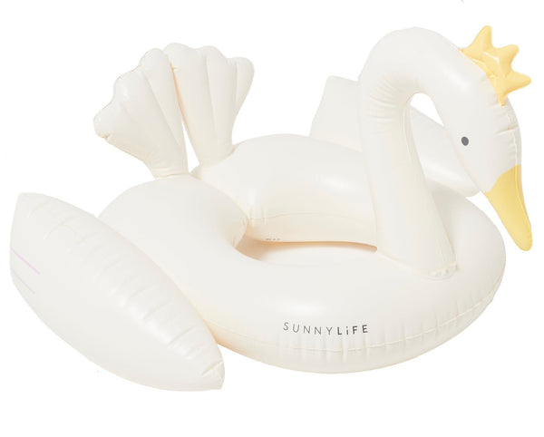 The Sunnylife Kids Tube Pool Ring, Princess Swan is an inflatable white swan pool float featuring a gold crown and the "SUNNYLIFE" brand name on its side. Made from durable PVC, it is non-toxic and Phthalate-free, ensuring safe fun in the pool.