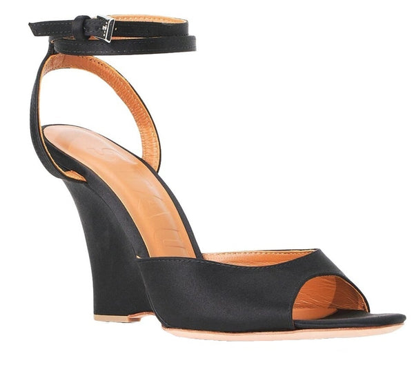 Image of the Staud Anoush Wedge by Nest, a black satin evening sandal featuring an ankle strap and open toe design.