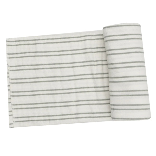 The Angel Dear Modal Rib Stripe Desert Sage Swaddle Blanket features a rolled-up gray and white striped fabric, with a section unrolled and laid flat to highlight its soft and versatile design, making it ideal for cozy swaddles.