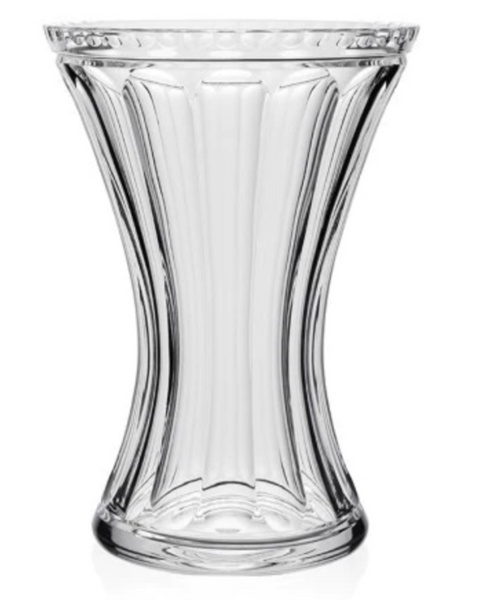 The William Yeoward Crystal Juliet Waisted Vase, 11”, features a clear, hourglass shape with vertical grooves and a smooth finish, epitomizing the elegance of handmade crystal craftsmanship by William Yeoward Crystal.