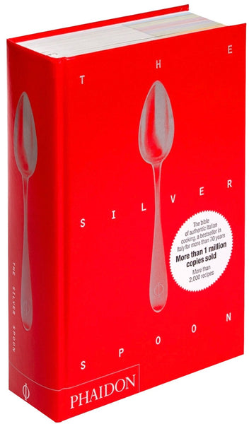 A red Italian cookbook adorned with the Silver Spoon New Edition by Phaidon.