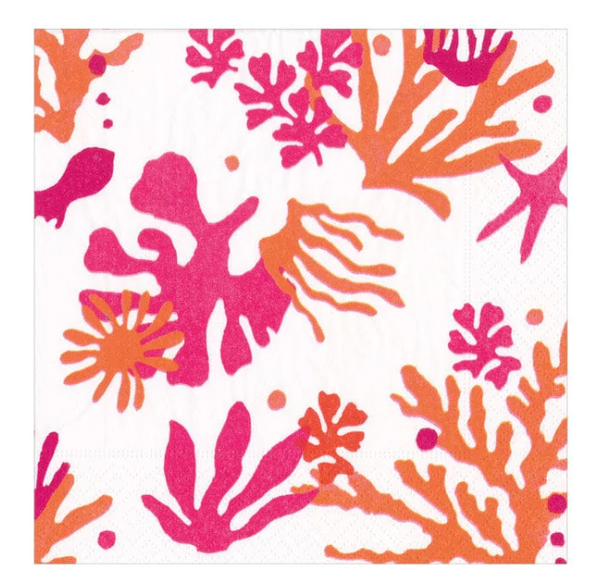 This is an image of a Caspari Matisse Coral Cocktail Napkin, featuring a pattern of coral and sea life in shades of pink and orange.